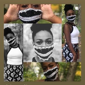 Black “Zip the lips” face mask with white zipper